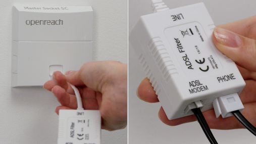 Hand inserting mircofilter into the master socket, and a broadband cable plugged into the microfilters left socket, and phone cable plugged into the right socket.