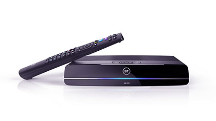 BT remote resting on TV box